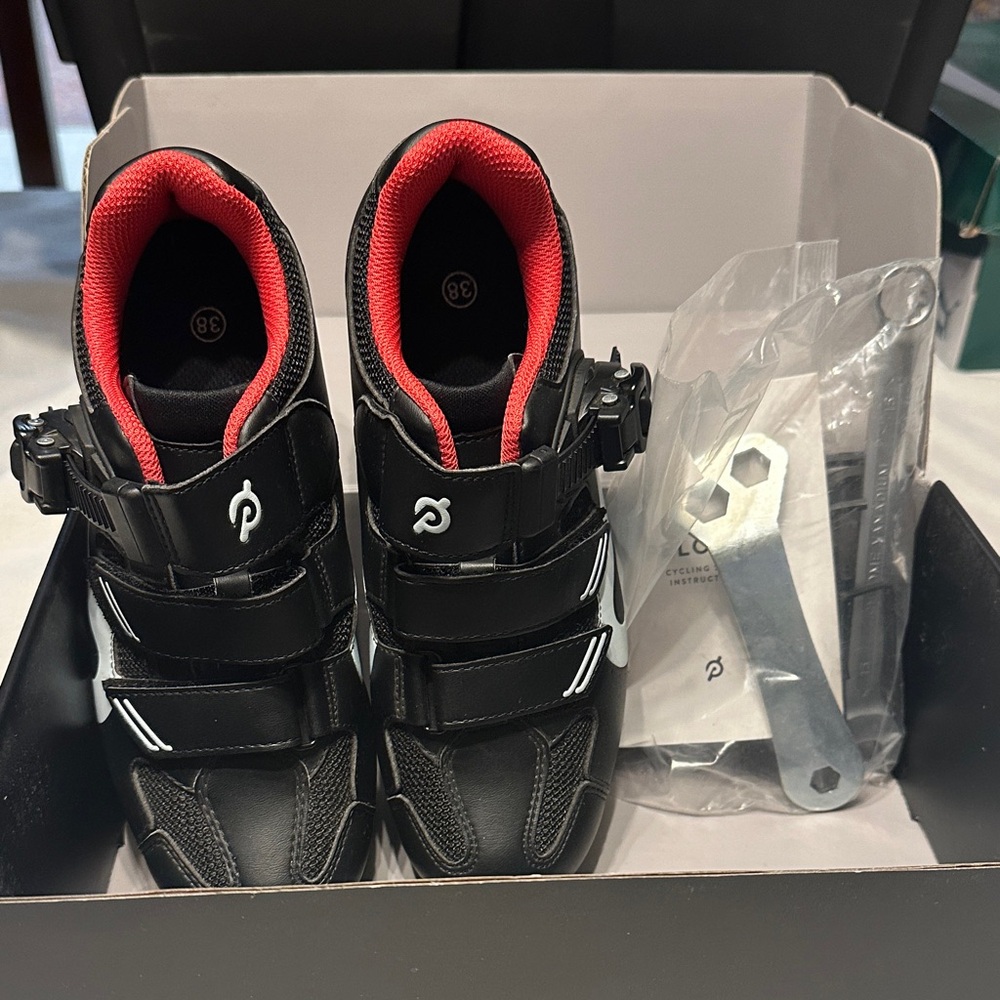 Peloton Black Shoes with Vibrant Red Lining